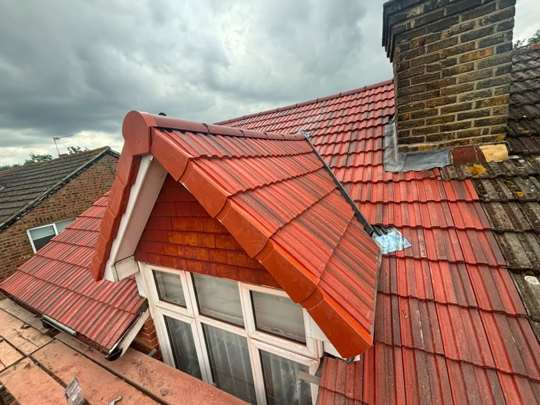 Damaged flashings and slipped tiles on a Richmond roof